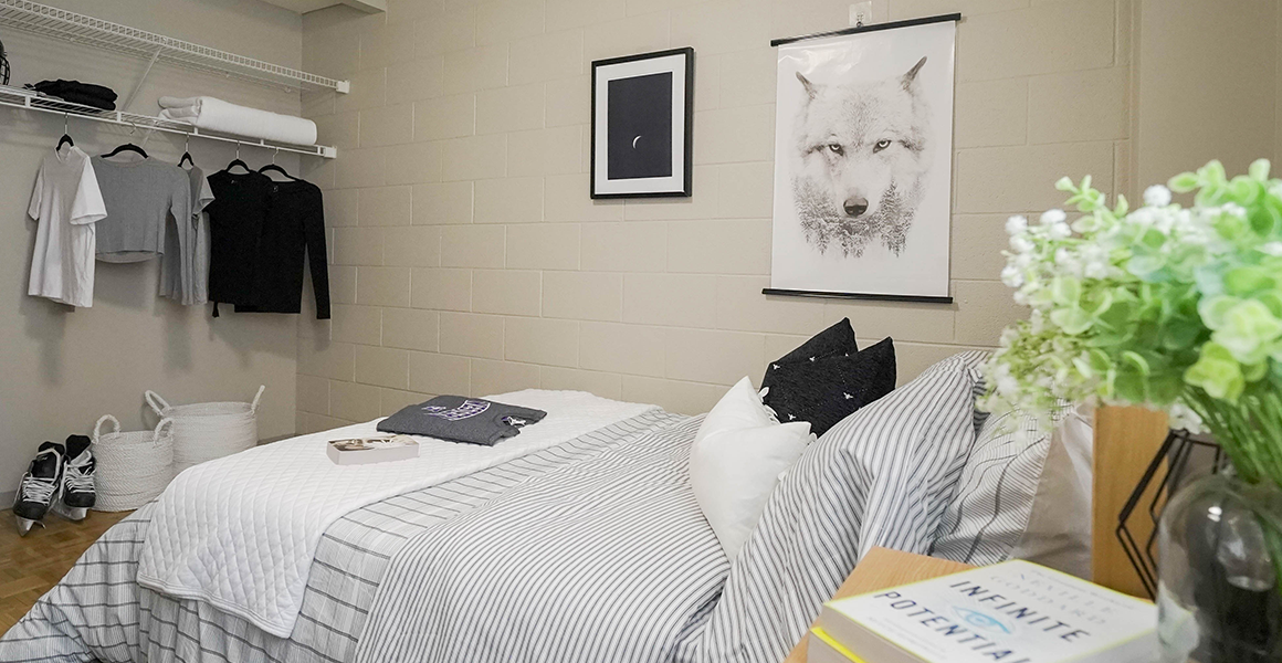 Bedroom showing bed and closet