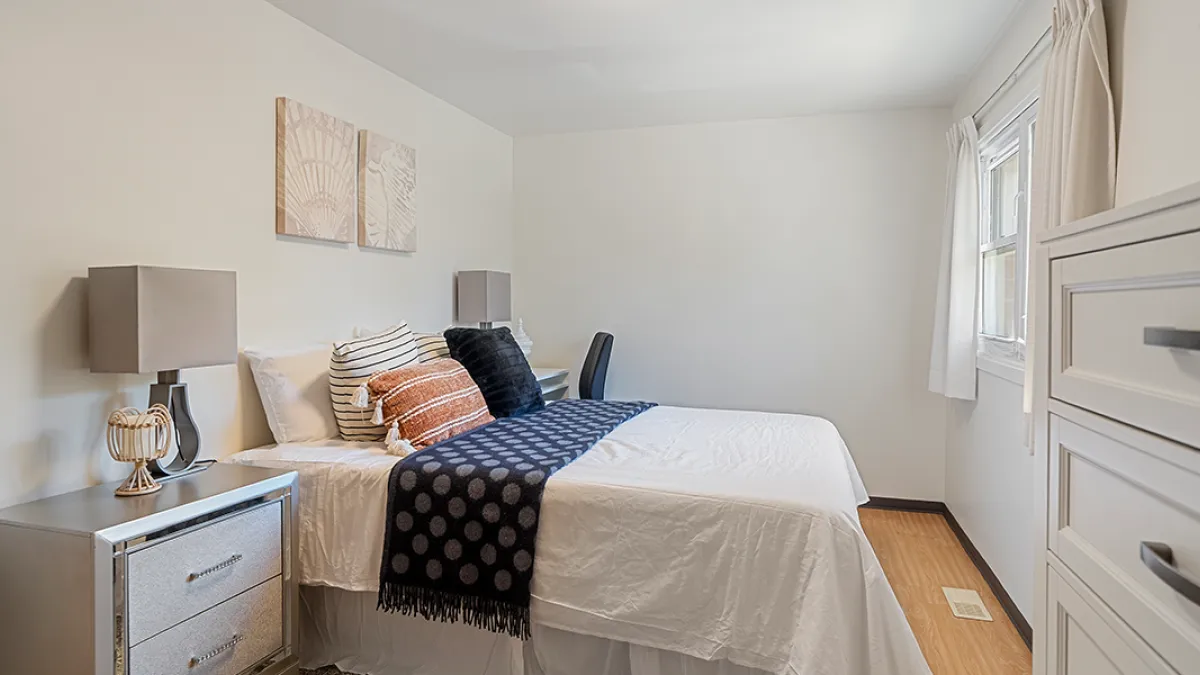Bedroom showing bed and two side tables